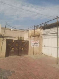بيت مع محلين • ٣٠٠م • جسر ديالى شارع ٦٠