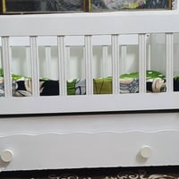 تخت اطفال • موصل رجم حديد