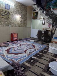 حي الشهداء الجديدة • غرفتين نوم • محل داخل البيت