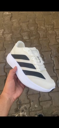 اديداس ادزيرو • ابيض اسود • مقاسات 40،42،43،44