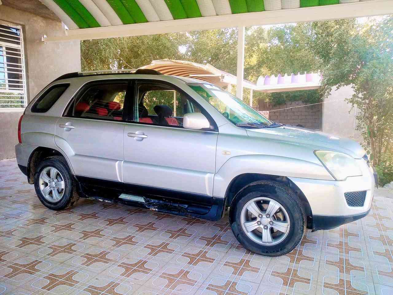 للبيع سبورتج 2009 خليجي مكفوله رقم اربيل دولي الجديد بسمي 
محرك 2000 دوش مكفوله من الضربه والفتح والصبغ وسونار مرفق بالمنشور السياره جديده مكينه كير حداديه جدد تخم تاير جديد تبريد ثلج 
السعر 110 وبيه مجال 
للاتصال ***********
***********
المكان بابل الحله
