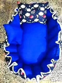 عش طفل • مخدة ونجمة • تطريز اسم