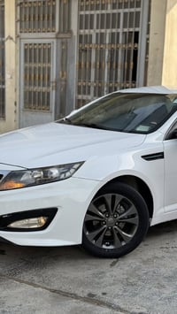 اوبتيما ٢٠١٢ • مكينة ٢٠٠٠ • كفالة عامة