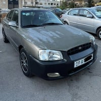 اكسنت 2003 • اوتوماتيك • صاحب الكرت