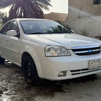 اوبترا 2012 رقم بغداد السياره نضيفه ومدوشمه ماشية 97 بيه قبق جنطه وجام...