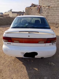 كيا سيفيا موديل ٩٥ لون ابيض تدفئة تبريد رقم صلاح الدين..السعر ٤٢بي مجا...