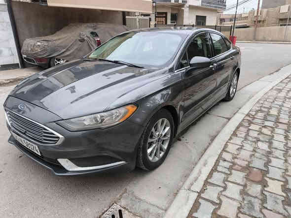 السلام عليكم شباب عندي فورد فيوجن موديل ١٨ محرك ١٥٠٠ تيربو  سياره جديده وحلوه وجاهزه من كولشي بيها قطعه صبغ وربع جاملغ الخلفي بارد والباقي كفاله مكان السياره بغداد الدوره السعر ١١٣ ورقه وهذا رقمي *********** وهذا بي واتساب *********** بغداد
