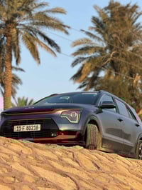 كيا نيرو موديل :2024 لون ازرق  هايبرد  الفئه :ex فول للاخير  المواصفات...