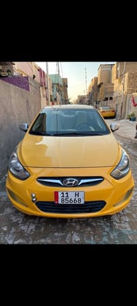 اكسنت موديل 2015 وارد خليجي ماشيه 85 بسمي بغداد مصفره من كلشي كير محرك...
