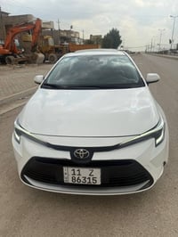 كورلا 2025 هايبرد  فول مواصفات   باسمي تحويل ثاني يوم  ماشيه 20 الف  ب...