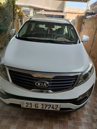 سبورتج 14 خليجي ابيض نص فول محرك 2000 دوش كير ومحرك مكفول بيها ضربه با...