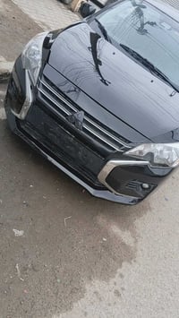 عندي سياره مسيو بيشي ميراج هاش باك مديل 24 ماشيه 6000اخت الزيرو بدون ر...