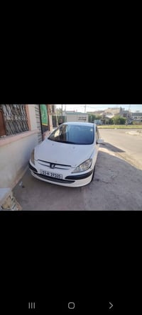 بيجو ابيض اللون رقم جديد دولي بغداد بيها أماكن طخات سياره جدا نضيفه ال...