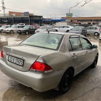 لانسر ٢٠٠٩ • دهان ٣ قطع • مكينة كبيرة