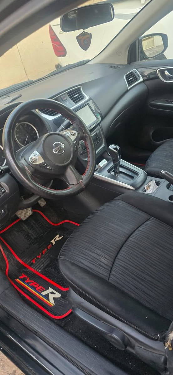 نيسان سنترا موديل 2019 لون اسود بغداد  نوع SV محرك 1800 المرغوب
حادثها جامغ وبنيد ومبدلات وبيها كم قطعه صبغ وبيها شبر حار باب السايق جوه يده الباب موصفاتها معروفه السيارة بغداد ومكان السيارة بغداد بااسمي  بصمه تشغيل وبصمه ابواب  تحكم استيرن جهتين تدفئة تبريد حساس اطارات  السيارة خير من الله  هاي الصور كدامك شوفت عينك السيارة كلها كاعدة ومليون عافية للياخذها ويتهنى بيها ان شاء لله سعرها 95 $ ورقه وبيها مجال  وكلمن يكدر يشتري على كد امكانيته الشراي يتصل *********** بغداد, العراق
