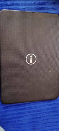 حاسبة دل  مواصفاتها بالصورة  ضربتها مو ضحة بالصورة  نقصها بطارية + شاح...