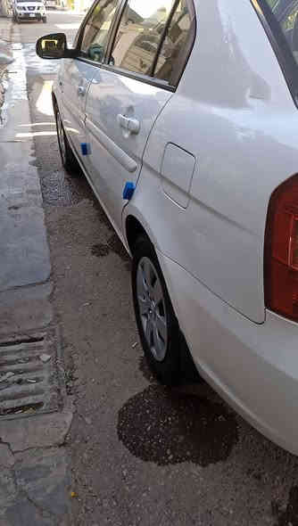 السلام عليكم اكسنت ٢٠١١ خليجي محرك ١٦٠٠ گير ومحرك وتبريد وصدر امامي خلفي جديد تخم تاير السياره بيها طخه بين الباب والجاملغ من جوه بأسمي السياره وبيها سونار العنوان بغداد والسعر ٩٥  وبيه مجال هذا رقم ***********
