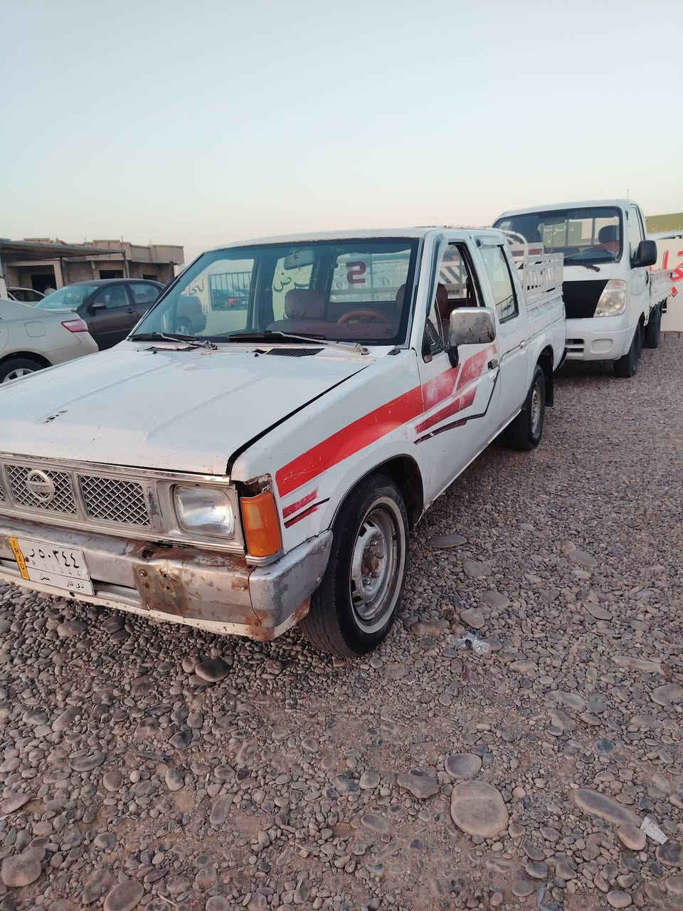 السلام عليكم للبيع او مراوس حسب القناعه بيكم نيسان موديل 92محرك كير شرط صدر خلفي امامي جديد تخم تاير تبريد فقط غاز رقم الماني ذي قار وكاله عامه بسمي باركود السعر 32ومجال جدا قليل هاتف***********مكان السياره مفرق الشرقاط
