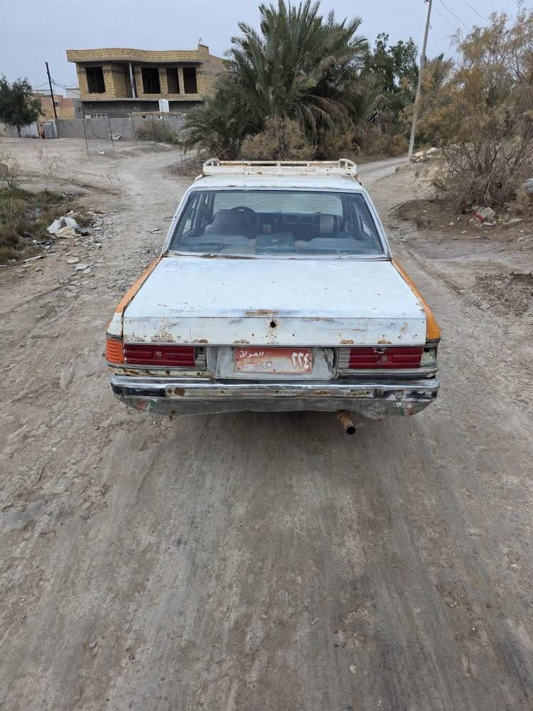 سلام عليكم سوبر مديل ١٩٨٠ سياره جاهزه محوره مكينه كير كسن ونجي جدد حويه سياره جاهزه تخم تاير جديد قبل سبوع شدهن حداديه جديده رقم مثنى تحويل رقم ***********  السعر ١٠ ورقه المكان نا صريه سوق سوق الشيوخ, ذي قار
