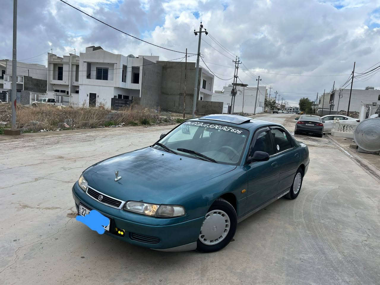 مازدا فاسۆلیا مودێل 1992رەنگی سەوز گێڕ مەکینە تەبرید گەرمی بەشەرت چوار تایەی تازە تاخم پێشی تازە سەنەوی تازە  دەفتەر بەنزین سعری 54وەرەقە رقم تەلەفۆن ///***********///*********** كركوك, العراق
