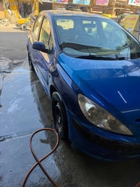 بيجو ٢٠٠٥ • رقم بغداد • محرك سليم