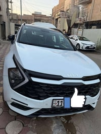 عندي كيا سبورتج موديل 2024 جيتي لاين اعلى مواصفات  رقم بغداد بسمي سيار...