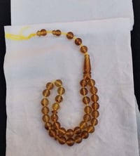 كهرمان أصفر • ٣٣حبة • ١٠ملم