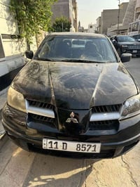 اوتلندر • ٢٠٠٤ • مرقمة بغداد