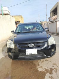 وبركاتة سبورتج موديل 2006 رقم بغداد وراد خليجي فول ما عدا البصمه بيها ...