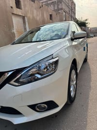 نيسان سنترا • 2025 • سيارة نيسان • سنترا 2025 • سيارة داخل احمر • جلد ...