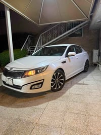للبيع كيا اوبتما  موديل 2014 محرك 2400 GDI  وارد كندي بيها 3 قطّع  بني...