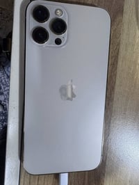 12 برو ماكس ذاكره 128 البطاريه 77 اصليه مال جهاز تلفون امريكي اصلي  ال...