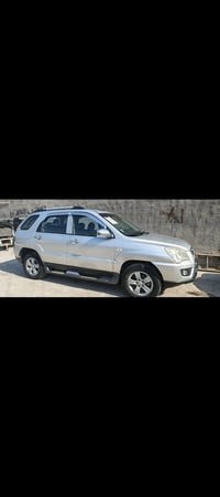 للبيع كيا سبورتج موديل ٢٠٠٩ كفاله عامه الون رصاصي فضي داخل اسود محرك ٢...