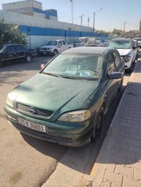 استرا 2002  رقم بغداد كير عادي بلاديه للبيع مكاني بغداد تبريد منظومه م...