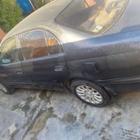 تويوتا كورونا صالون موديل 1992 بيهه بس قطعتين فقط محرك كفاله بس بيه صف...