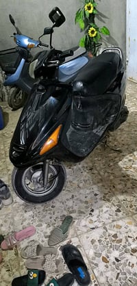 سكوتر • أسود • حالة جيدة