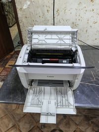 من رخصة الادمن المحترم...  طابعة كانون 6030  مكفولة نظافة 100% مشتغلة ...