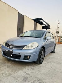 نيسان فيرسا  2009 رقم بغداد انكليزي جديد باسمي  مكينه 2000 كير مكينه م...