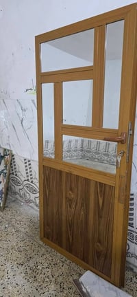 ابواب حديد والمنيوم سعر الباب 50 إلي يردهن يتصل على هذا الرقم 07838783...