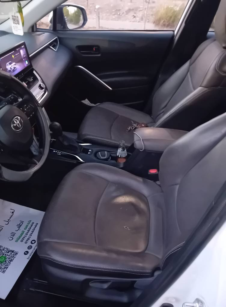 السلام عليكم للبيع كورلا كروس 2024 وارد خليجي(صيني) هايبرد ماشية 38 الف كيلو فول موصفات السيارة مشتريها زيرو على ايدنا من شركة باركود مكفولة كفالة عدا شخط صغير موضح بصور عارضها ب 25 مليون  مكاني بغداد حي الجامعة 
للاتصال *********** بغداد, العراق
