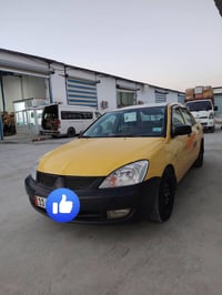 سياره لانسر موديل 2010 سياره كفاله عده طخه بلباب الوره باب الصدر ورش ج...