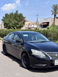 نيسان سنترا 2014 خليجي سياره نضيفه بيها جاملغ امامي صبغ ومكانين بارد ف...