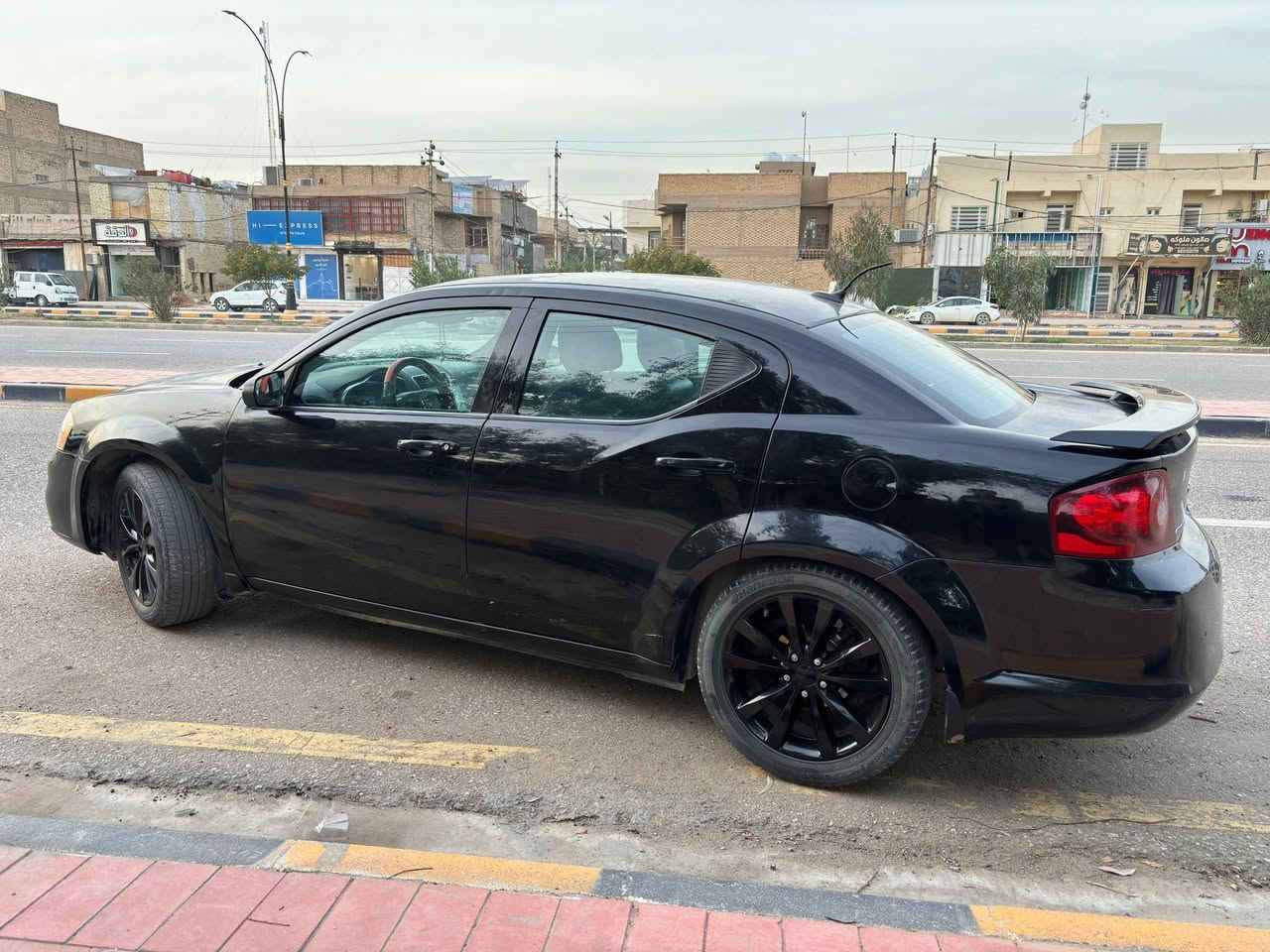 دوج أفنجر 2014
اللون: أسود
وارد أمريكا – كلين تايتل (بدون ايرباك) المحرك: 2400 سي سي قوي واقتصادي
رقم بغداد – مشروع وطني
بأسمي شرط التحويل (عقد مروري)
سنوية لنهاية 2026

 المواصفات:
شاشة عرض أندرويد حديثة
كامرة خلفية
حساسات خلفية
تدفئة وتبريد شغال 100%
تخم ديسكات جديد (سيراميك اصلي)
منظومة زينون أصلية 
إضافة مضخمات صوت عالية جداً
السيارة مدوشمة لون أسود × أحمر
كهربائيات على وضع الشركة بدون اي چطل
المسافة المقطوعة: 149,000 حقيقي
 الاستخدام: شخصي فقط
 الحالة: نظيفة وجاهزة
 صور السيارة في أمريكا مرفقة بالمنشور

 ملاحظات :
طخة خفيفة بالباب عكس السائق (صارت داخل العراق)
صبغ قطعة واحدة فقط (دعامية أمامية بسبب شخوط)
جراد البنيد والقمارة فقط

💰 السعر: 90$ مع المجال البسيط
السيارة نظيفة وجاهزة وكلين تايتل من امريكا والي يشوف السعر مو مناسب يرفع المنشور بالصلاة على محمد وال محمد 

مكان السيارة النجف الاشرف
للاستفسار: ***********
