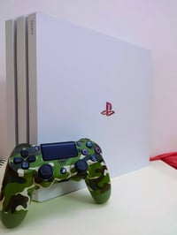 بلايستيشن٤ برو ابيض • اشتراك سنوي فاخر • أكثر من ٤٠٠ لعبة