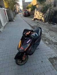 دراجة نارية • بغداد شعب • كفالة