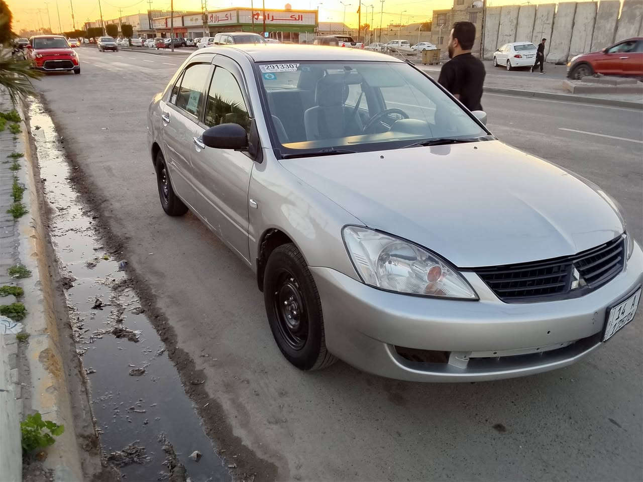 لانسر 2004مصبوغه عام  مكينه تبخر  بكاني بغداد الرقم  ***********موجود واتساب
