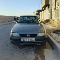 اوبل استرا (١٩٩٥) للبيع رقم بغداد بسمي كير و مكينة وكشر مكفولة سيارة ج...