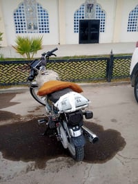 تايكر م٢٥ • دراجة نارية