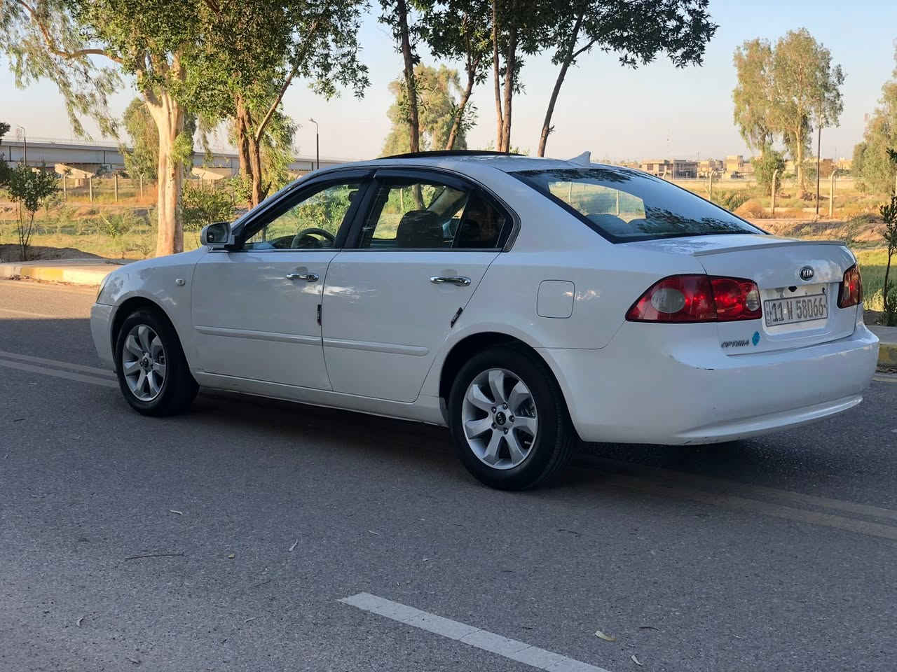 السلام عليكم اوبتيما  للبيع موديل 2006خليجي مكينه 2000شرط حاويه السياره فول مواصفات فتحه شاشه تبريد بيانو السياره حادثه جاملغ خلفي مصبوغه حزام تخم تاير تبريد ثلج حداديه شرط جديده رقم بغداد انكليزي شرط التحويل الشراي يتصل على الرقم ***********مكاني بابل المسيب
