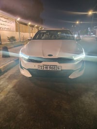 كيا k5خليجي  اللون ابيض رقم بغداد الجديد تحويل مباشر ثاني يوم فول عدة ...